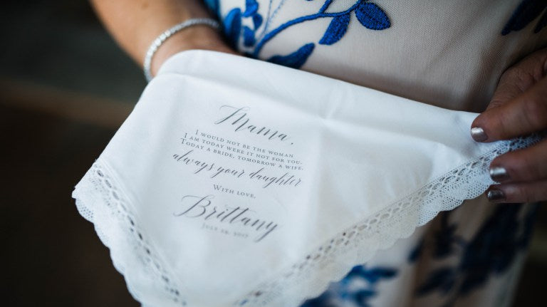 Mom holding lace handkerchief gift