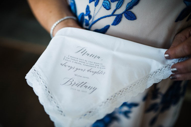 Mom holding lace handkerchief gift
