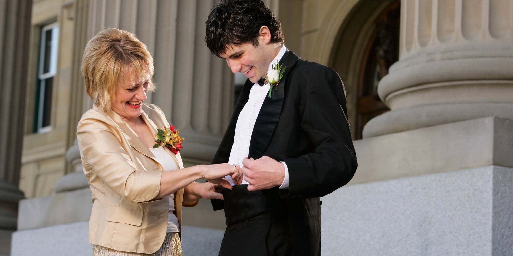 son and mom at wedding