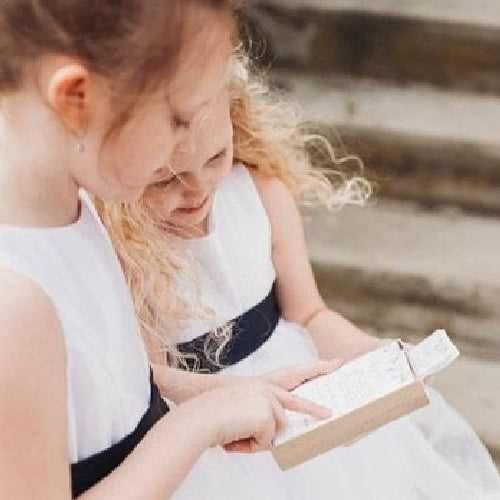 flower girls receiving gift handkerchief