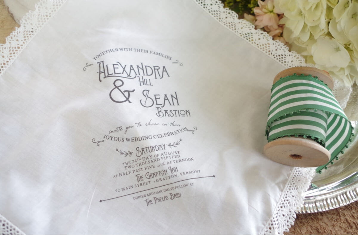 Handkerchief invitation with ribbon spool