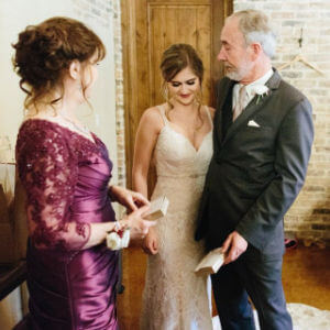 parents accepting handkerchief gifts from daughter