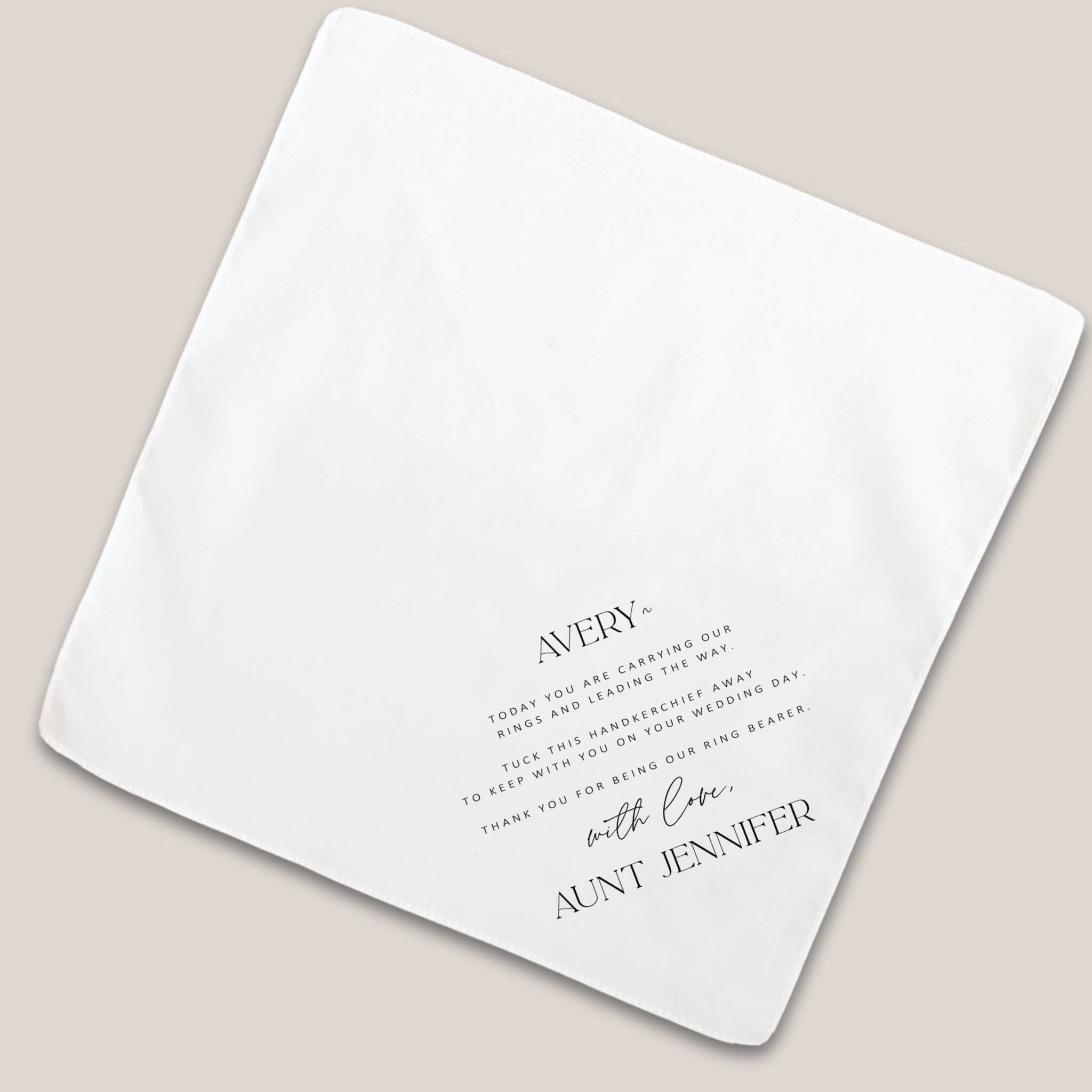 serif ring bearer handkerchief on beige background