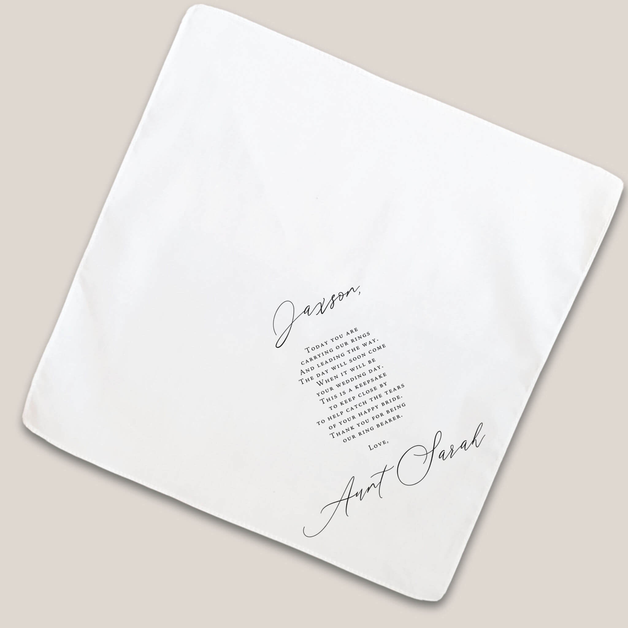 classic ring bearer handkerchief on beige background