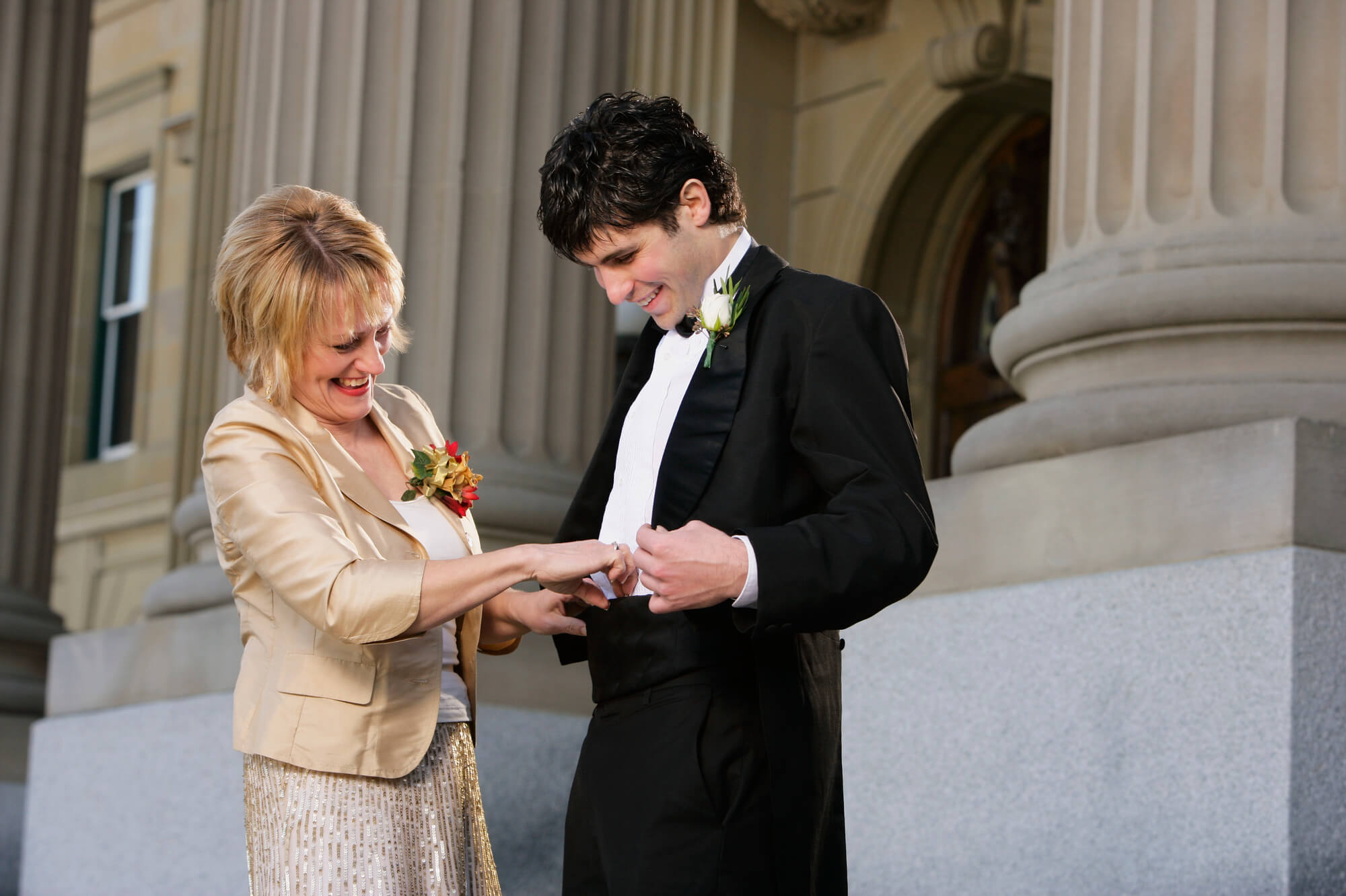 son and mom at wedding