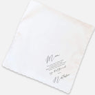 classic mother of the bride handkerchief laying flat on light grey background