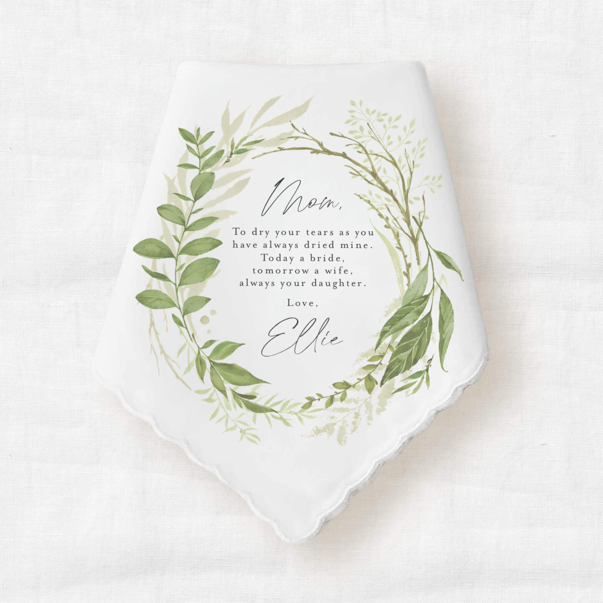 personalized women's handkerchief from the bride to her mother surrounded by a green leaves in a circle around the text