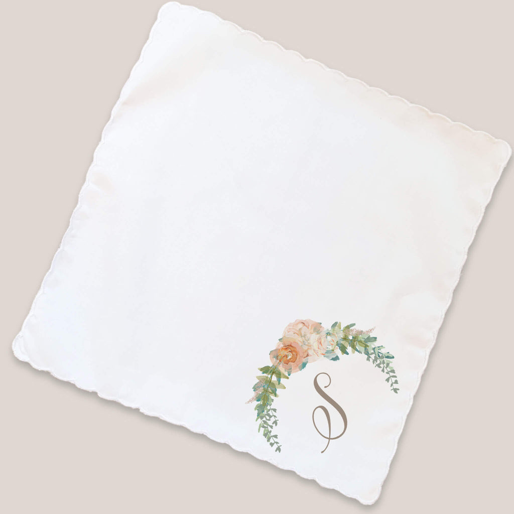 peach floral monogram handkerchief on beige background